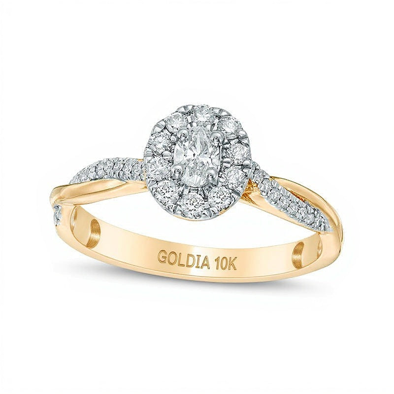0.38 ct. Gesamtgewicht Verlobungsring mit ovalem Diamanten und Halo aus 10K Gelbgold
