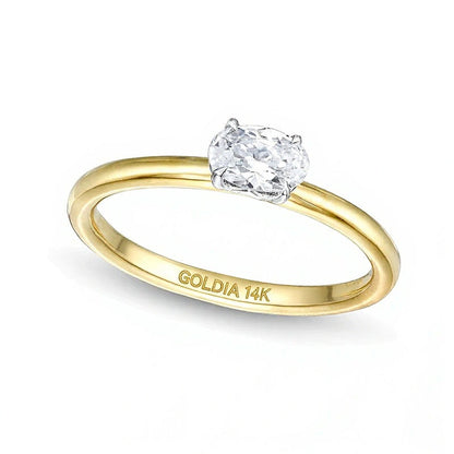0.5 CT. Solitär-Ring mit ovalem Diamant quer in 14K Bicolor-Gold (I/I2)