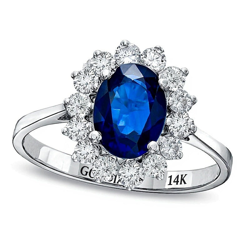 Verlobungsring mit ovalem blauem Saphir und 0,38 ct. Gesamtgewicht Diamanten im Halo in 14K Weißgold