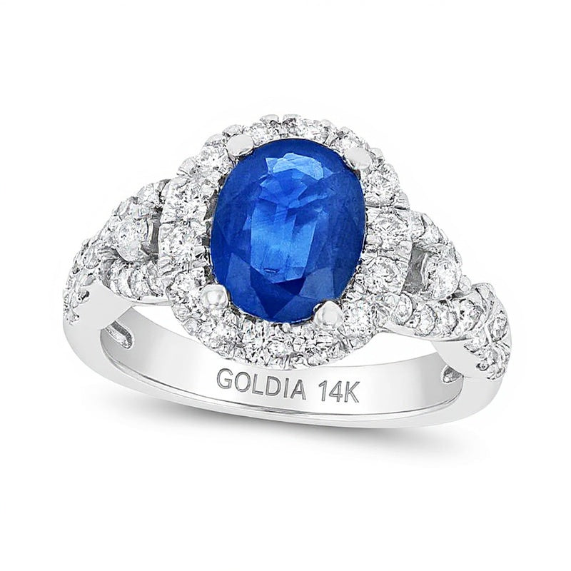 Halo-Ring mit ovalem blauem Saphir und runden Diamanten 0,75 ct. Gesamtgewicht in 14K Weißgold