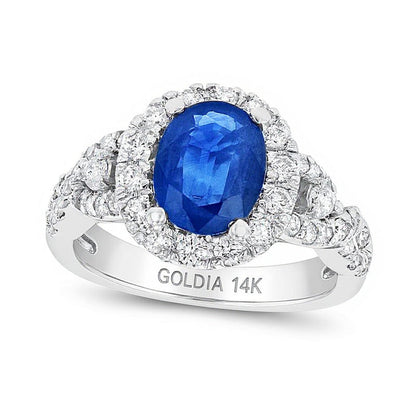 Halo-Ring mit ovalem blauem Saphir und runden Diamanten 0,75 ct. Gesamtgewicht in 14K Weißgold