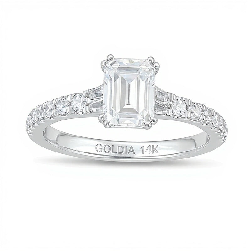 Solitär mit seitlichem Besatz mit Diamant und Smaragd im Smaragdschliff und Baguette 1.33 ct. Gesamtgewicht für Damen aus 14K Weißgold