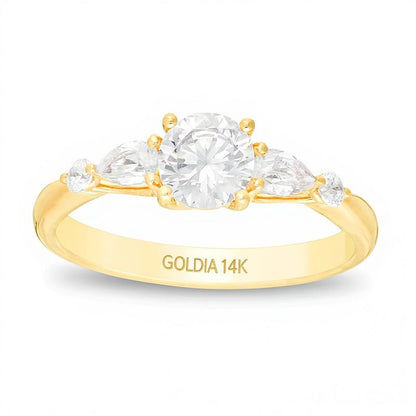 Solitär mit seitlichem Besatz mit rundem und tropfenförmigem Diamant 1.0 CT. Gesamtgewicht in 14K Gelbgold