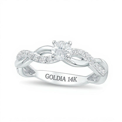 1.0 CT. TW Diamant-Verlobungsring im Twist-Design als Solitär mit seitlichem Besatz in 14K Weißgold