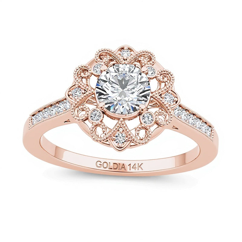 0.63 ct. Gesamtgewicht Diamant Verlobungsring im Vintage-Stil mit Blütenrahmen in 14K Roségold