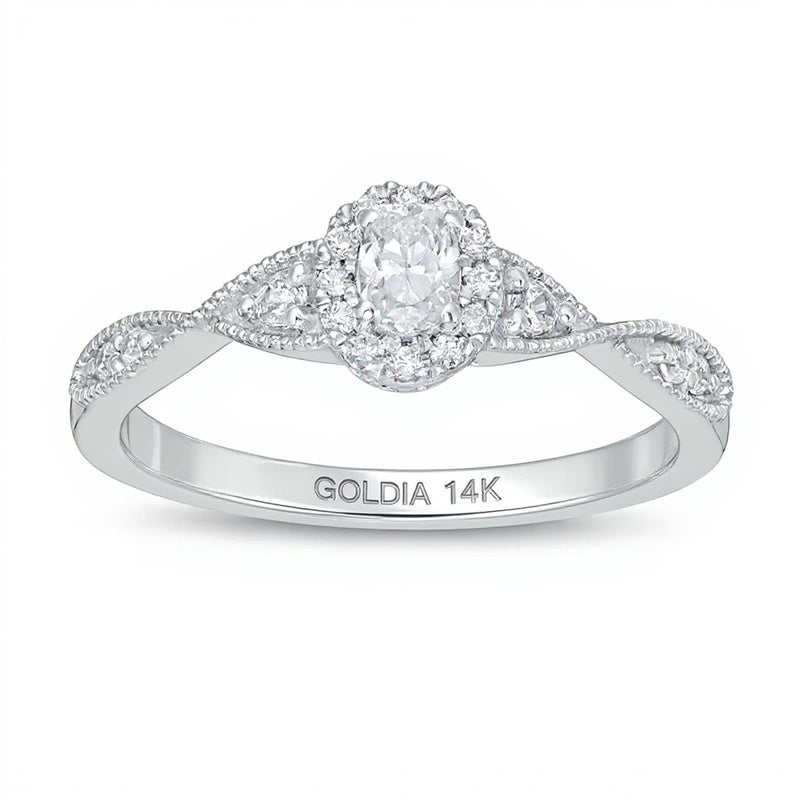 0.33 ct. Gesamtgewicht Verlobungsring mit Halo, ovalem Diamant und gedrehter Ringschiene in 14K Weißgold (I/SI2)
