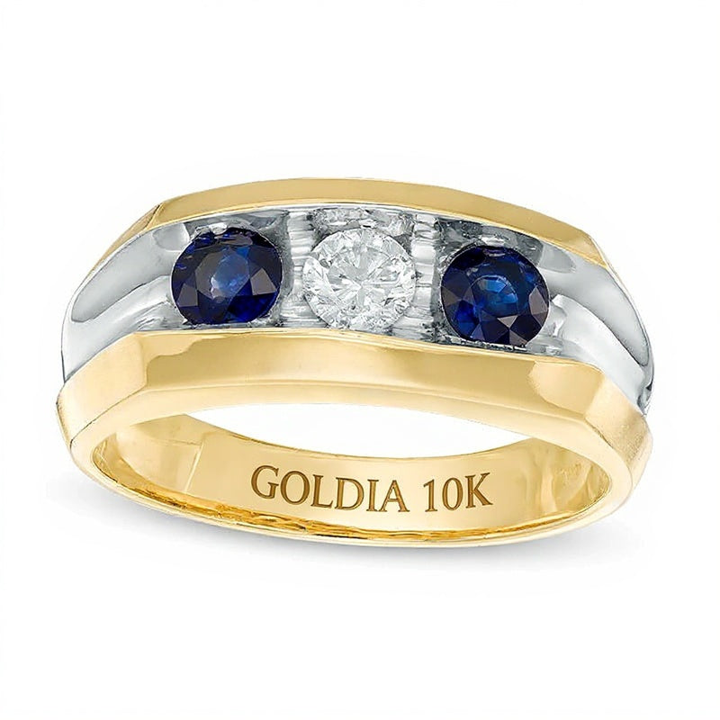 Ring mit blauem Saphir und 0.33 CT. Diamant im Dreistein-Design in 10K Gelbgold