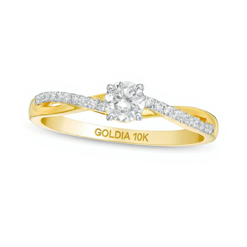 Verlobungsring mit gedrehter Ringschiene 0,33 ct. Gesamtgewicht Diamant, Solitär mit seitlichem Besatz, in 10K Gelbgold