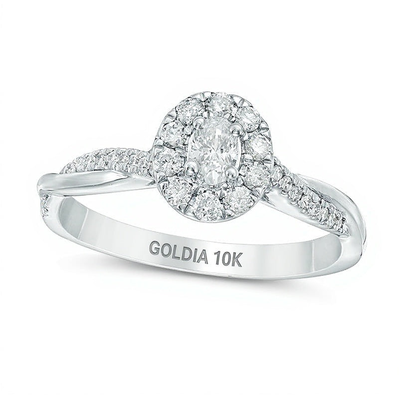 0,38 ct. Gesamtgewicht Verlobungsring mit ovalem Diamant im Halo und gedrehtem Ring in 10K Weißgold