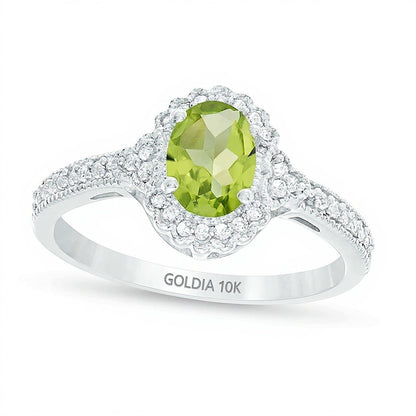 Halo-Ring mit ovalem Peridot und 0,13 ct. Gesamtgewicht Diamanten in 10K Weißgold