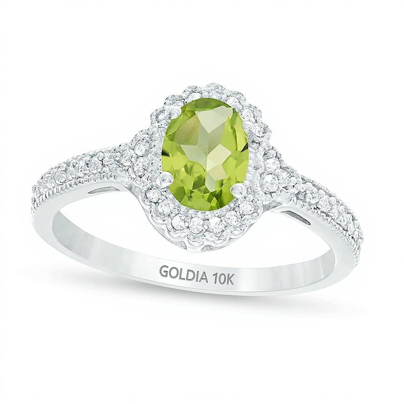 Halo-Ring mit ovalem Peridot und 0,13 ct. Gesamtgewicht Diamanten in 10K Weißgold