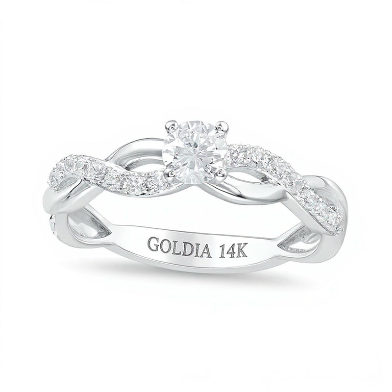 Solitär mit seitlichem Besatz mit Diamanten 1.0 ct. Gesamtgewicht in 14K Weißgold