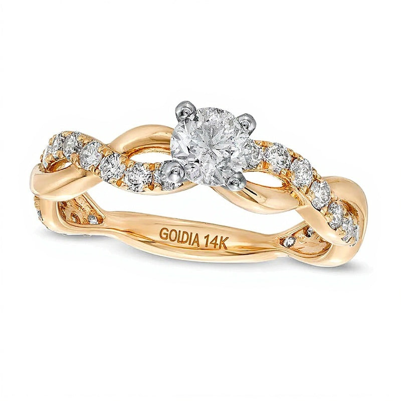 1.0 ct. Gesamtgewicht Diamant Solitär mit seitlichem Besatz Verlobungsring mit gedrehter Ringschiene in 14K Gelbgold
