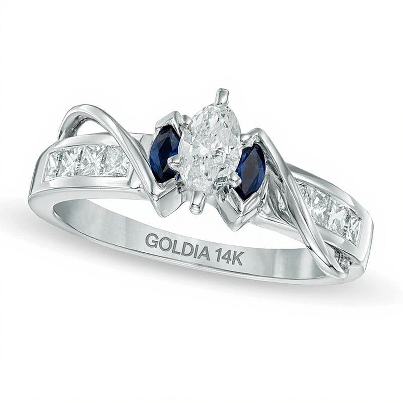 0,63 ct. Gesamtgewicht Dreistein-Ring mit Diamant im Marquise-Schliff und blauem Saphir in 14K Weißgold