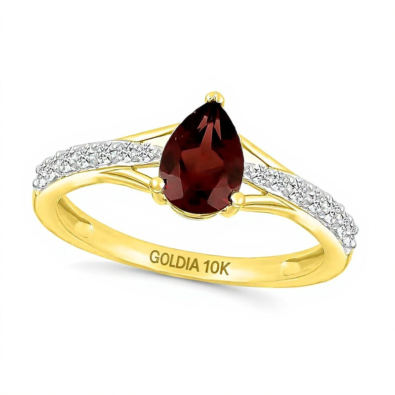 Fashion-Ring mit Granat im Tropfenschliff und weißen Labor-Saphiren rund in 10K Gelbgold