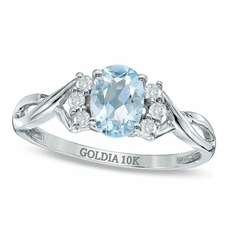 Ring mit ovalem Aquamarin und 0,13 ct. Gesamtgewicht Diamanten in 10K Weißgold