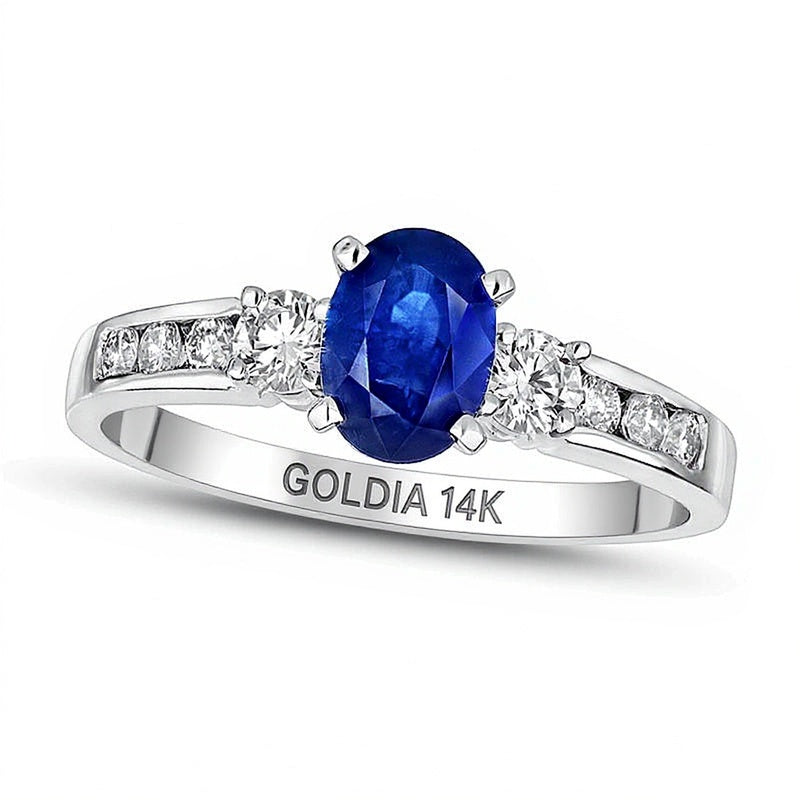 Ring mit ovalem blauem Saphir und 0,38 ct. Gesamtgewicht Diamanten, Solitär mit seitlichem Besatz, in 14K Weißgold