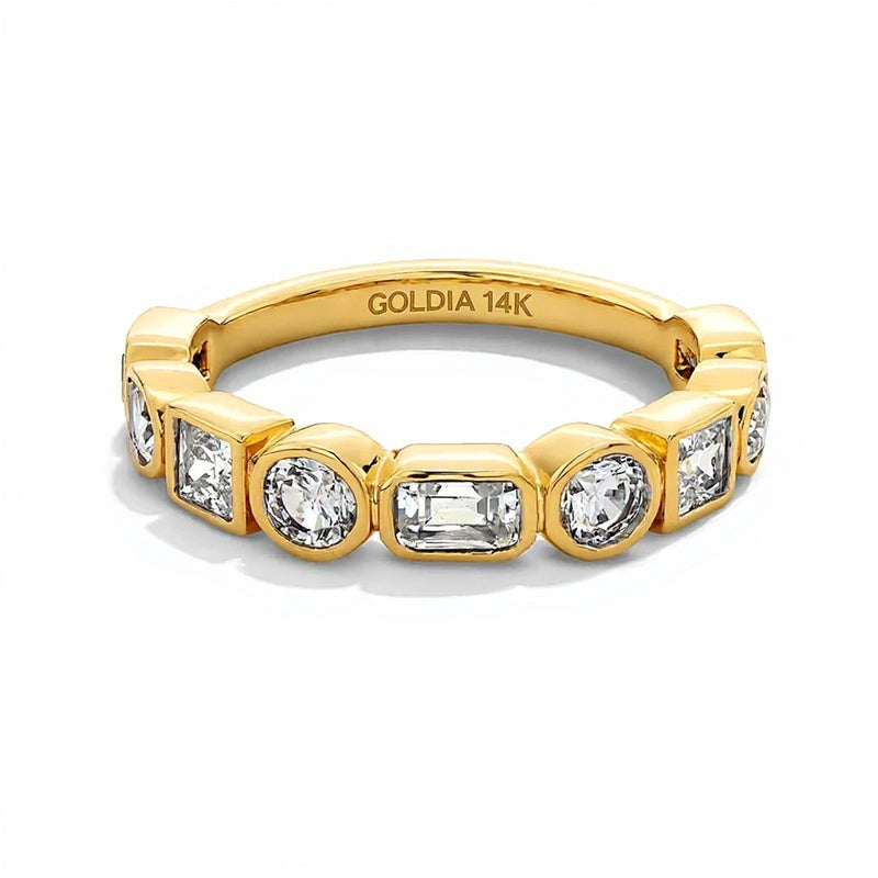 Memoire-Ring mit neun Labordiamanten in gemischten Formen 1.5 ct. Gesamtgewicht zargengefasst in 14K Gelbgold (F/VS2)