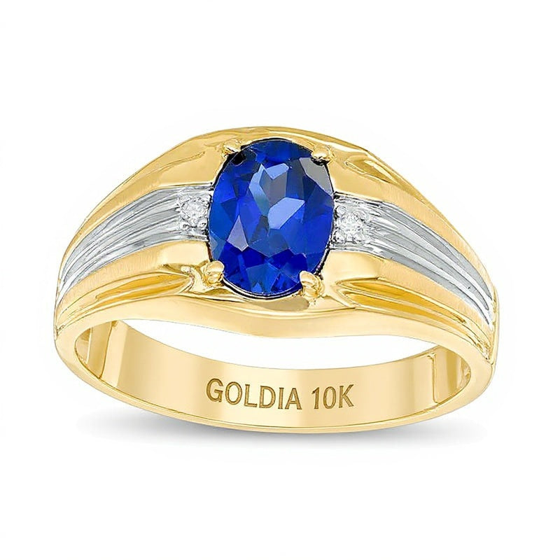Fashion-Ring mit ovalem im Labor gezüchteten blauen Saphir und Diamantbesatz in 10K Bicolor-Gold