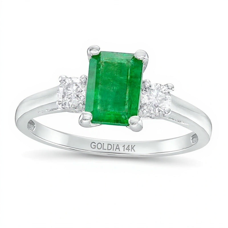Dreistein-Ring mit Smaragd im Smaragdschliff und 0,2 ct. Gesamtgewicht Diamanten in 14K Weißgold