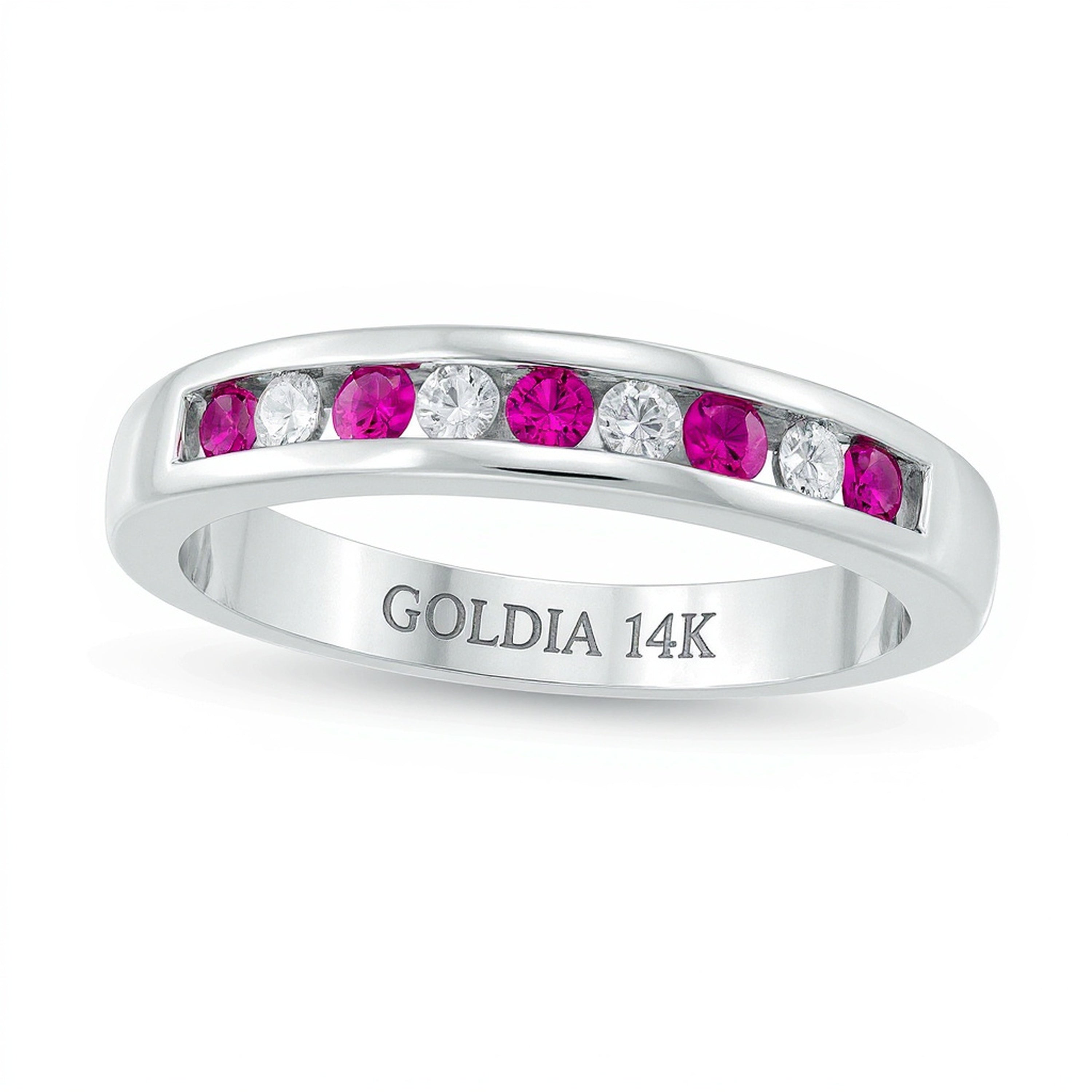 Ring mit Rubin und Diamant 0,13 ct. Gesamtgewicht, kanalgefasst und alternierend, in 14K Weißgold