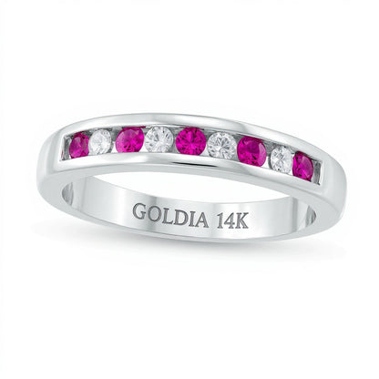 Ring mit Rubin und Diamant 0,13 ct. Gesamtgewicht, kanalgefasst und alternierend, in 14K Weißgold