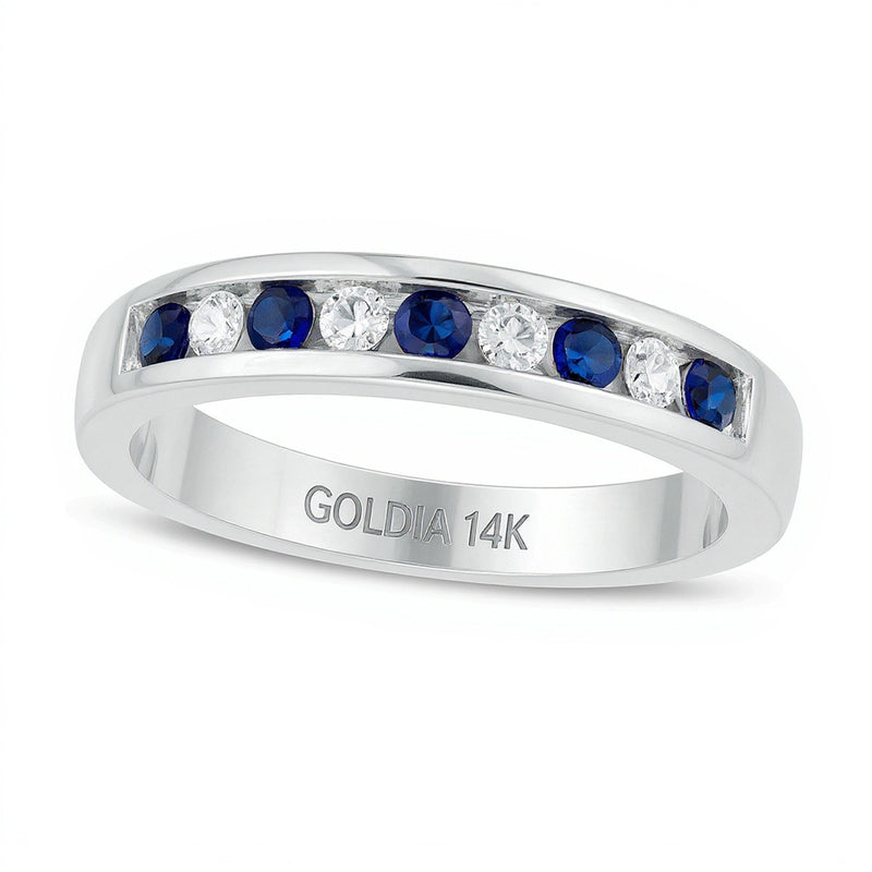 Ring mit blauem Saphir und Diamant 0,13 ct. Gesamtgewicht kanalgefasst im Wechsel in 14K Weißgold