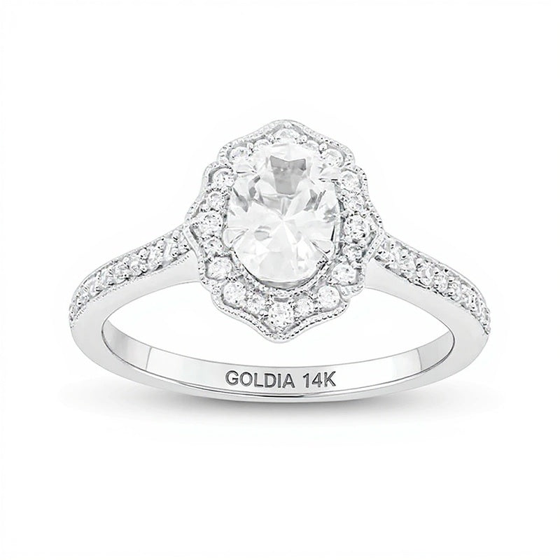 0.75 ct. Gesamtgewicht Verlobungsring mit ovalem Diamant und Halo im Vintage-Stil in 14K Weißgold (I/I2)