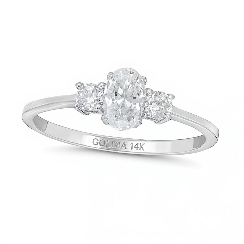 0,63 ct. Gesamtgewicht Dreistein-Verlobungsring mit Diamanten in Oval und rund in 14K Weißgold