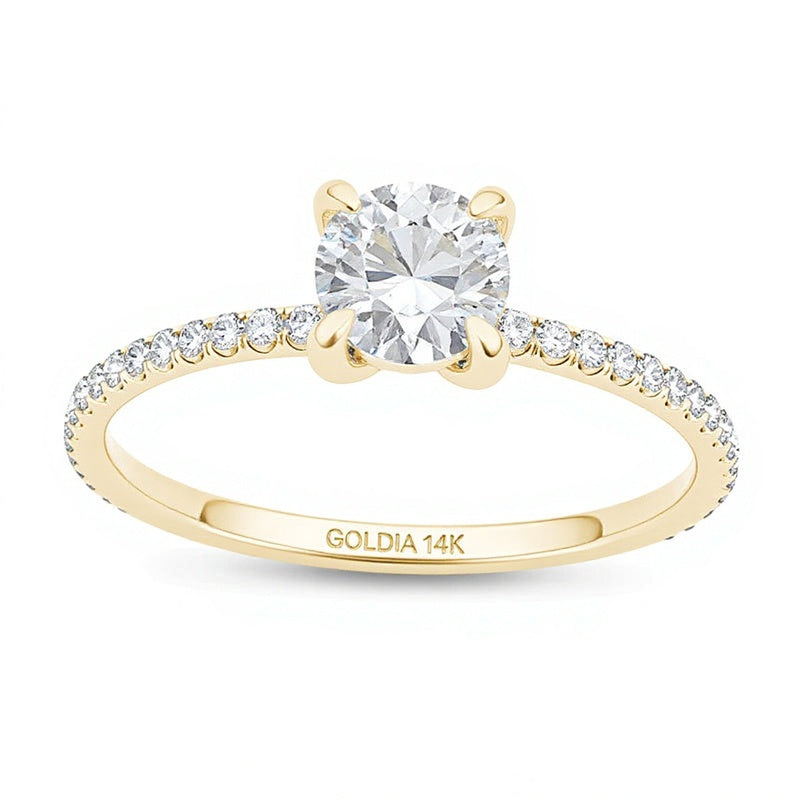 Solitär mit seitlichem Besatz Verlobungsring 0.75 ct. Gesamtgewicht Diamant in 14K Gelbgold