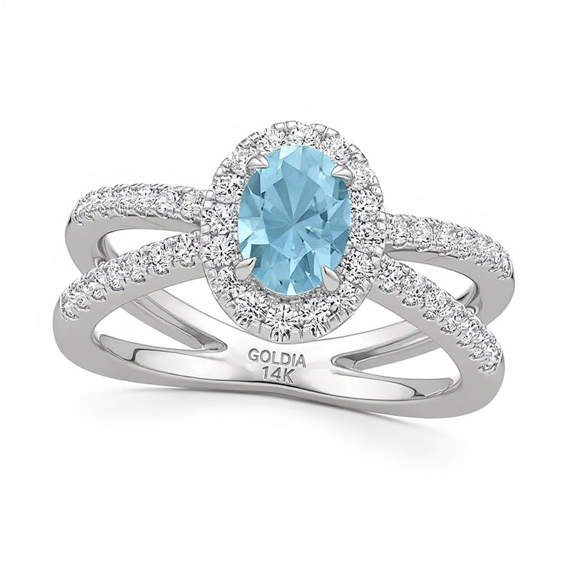 Ring mit ovalem Aquamarin und 0,33 ct. Gesamtgewicht Labordiamanten in 14K Weißgold