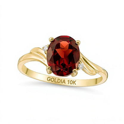 Solitär mit seitlichem Besatz mit ovalem Granat und Diamant im Bypass-Design für Damen in 10K Gelbgold