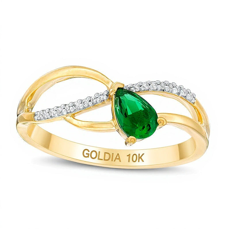 Freundschaftsring für Damen mit tropfenförmigem Labor-Smaragd und 0,05 ct. Gesamtgewicht Diamanten in 10K Gelbgold