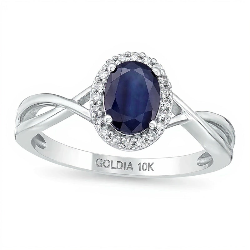 Ring mit ovalem blauem Saphir und 0,07 ct. Gesamtgewicht Diamanten in 10K Weißgold