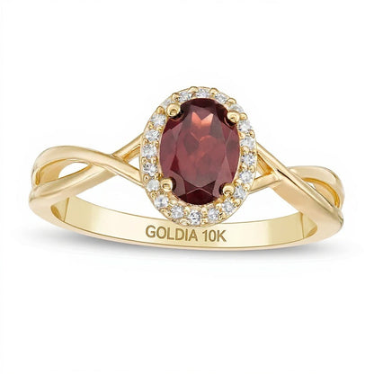 Ring mit ovalem Granat und 0,07 ct. Gesamtgewicht Diamanten mit gedrehter Ringschiene in 10K Gelbgold für Damen