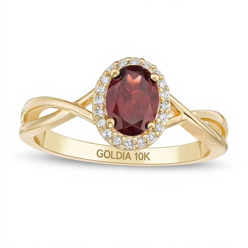 Ring mit ovalem Granat und 0,07 ct. Gesamtgewicht Diamanten mit gedrehter Ringschiene in 10K Gelbgold für Damen