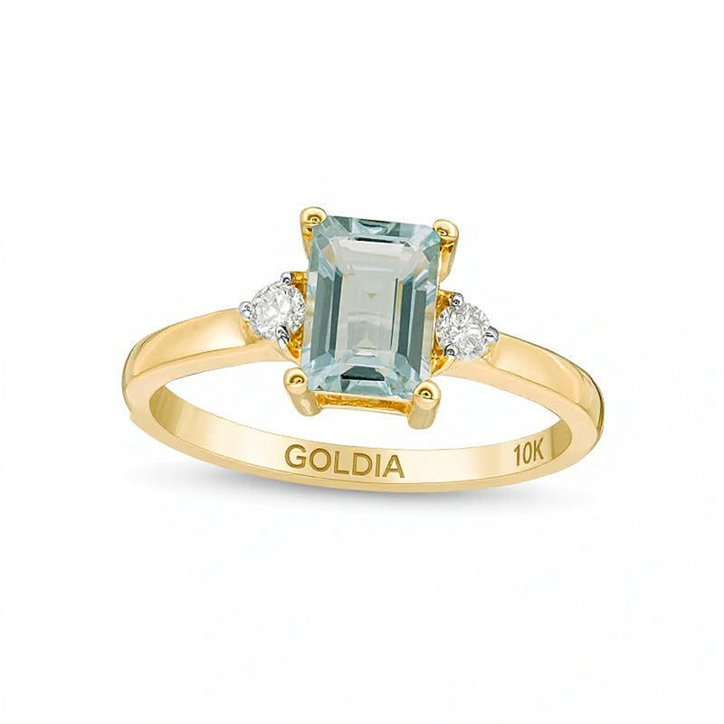 Ring mit Aquamarin im Smaragdschliff und 0,1 ct. Gesamtgewicht Diamanten in 10K Gelbgold