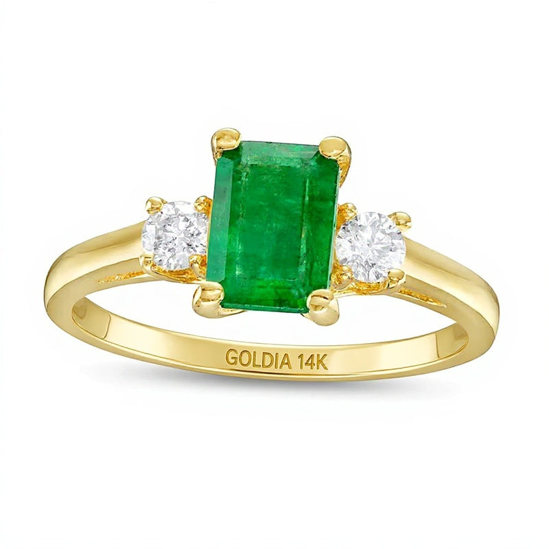 Dreistein-Ring mit Smaragd im Smaragdschliff und Diamanten 0,2 ct. Gesamtgewicht in 14K Gelbgold
