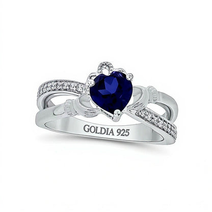 Claddagh-Ring für Damen mit herzförmigem blauem Labor-Saphir 5,0 mm und Diamanten 0,1 ct. Gesamtgewicht in rhodiniertem Sterlingsilber