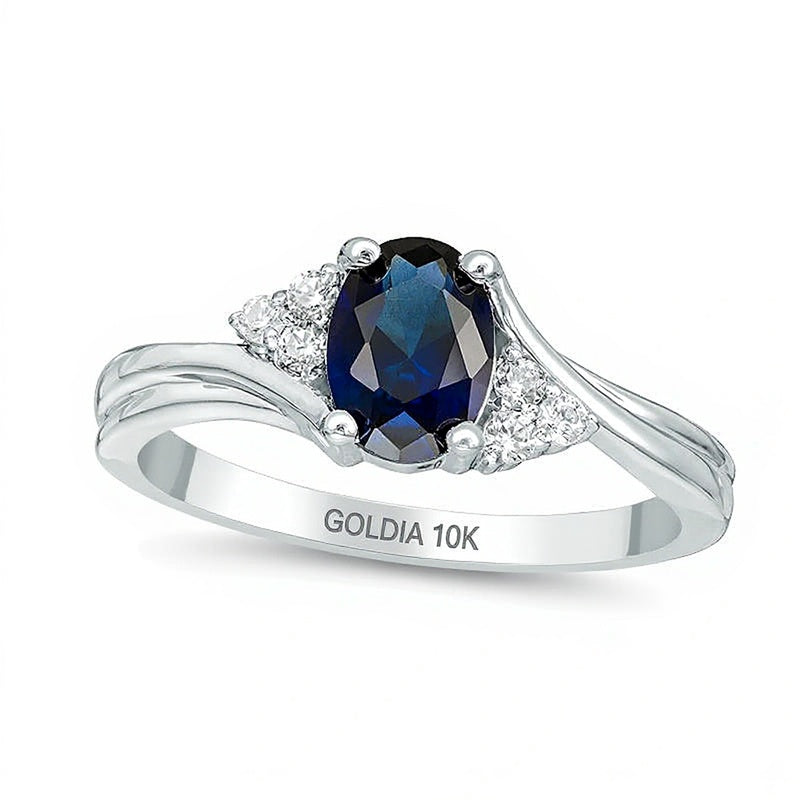 Freundschaftsring mit ovalem blauem Labor-Saphir und 0,1 ct. Gesamtgewicht Diamanten in 10K Weißgold