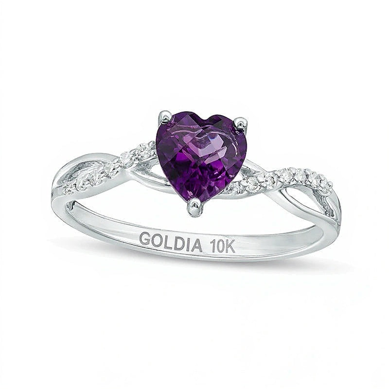 Ring mit herzförmigem Amethyst 6,0 mm und Diamanten 0,05 ct. Gesamtgewicht mit gedrehter Ringschiene in 10K Weißgold