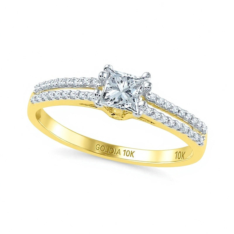 0.33 ct. Gesamtgewicht Solitär mit seitlichem Besatz mit Diamanten im Princess- und Rundschliff in 10K Gelbgold