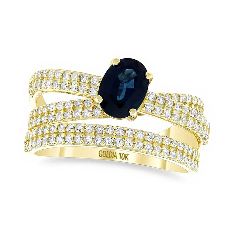 Ovaler blauer Saphir und Ring mit 0,63 ct. Gesamtgewicht Diamanten in Doppelreihe im Orbit-Design aus 10K Gelbgold