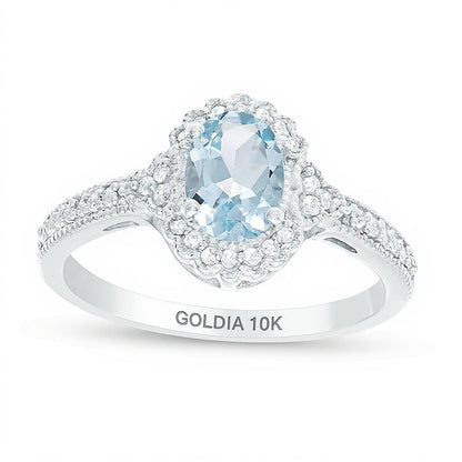 Halo-Ring mit ovalem Aquamarin und Diamanten 0,13 ct. Gesamtgewicht im Vintage-Stil in 10K Weißgold