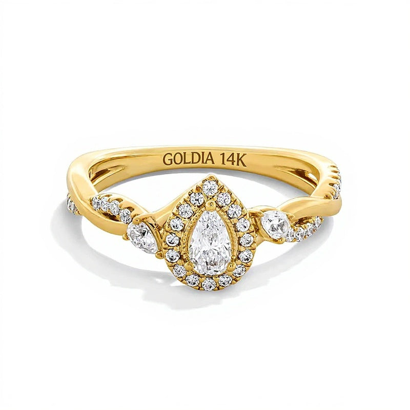 0.5 ct. Gesamtgewicht tropfenförmiger Diamant Halo Verlobungsring mit gedrehter Schiene in 14K Gelbgold