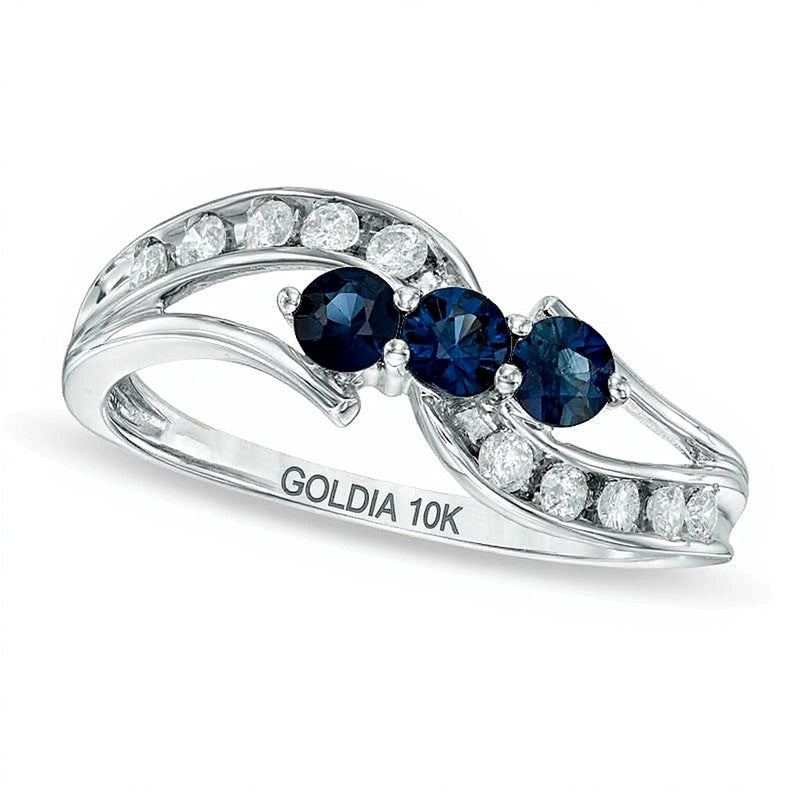 Blauer Saphir und 0,2 ct. Gesamtgewicht Diamant Dreistein-Bypass-Ring in 10K Weißgold