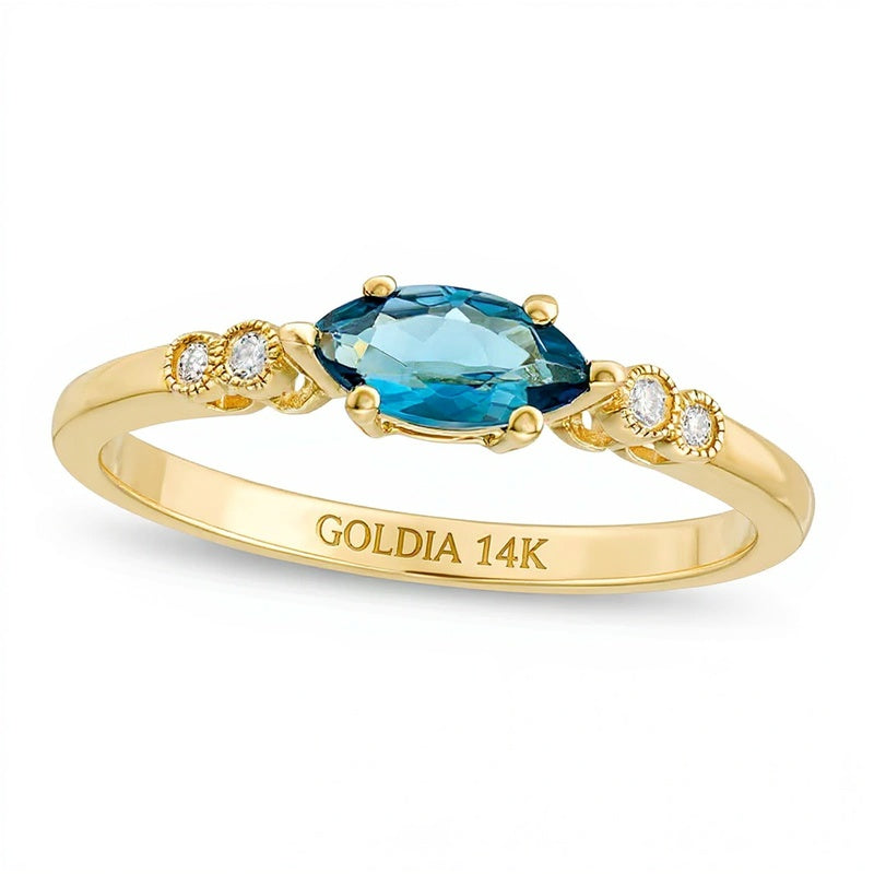 Fashion-Ring mit Marquise-Topas in Blau und Diamant in 14K Gelbgold