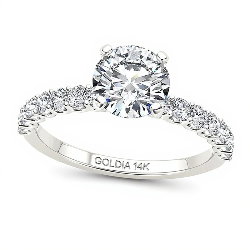 Solitär mit seitlichem Besatz mit 1.0 ct. Gesamtgewicht Diamant in 14K Weißgold