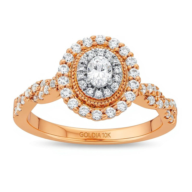 0.63 CT. TW Verlobungsring mit ovalem Diamant und Halo im Vintage-Stil mit gedrehter Ringschiene in 10K Roségold