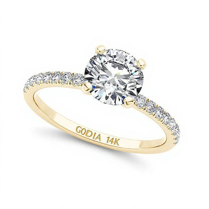 Solitär mit seitlichem Besatz mit Diamanten 1.0 CT. Gesamtgewicht in 14K Gelbgold